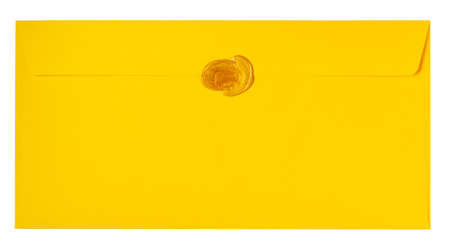 yellow envelope isolated on white backgroundの写真素材