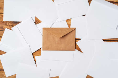 Stack of envelopes on working desk top view. Business mailの写真素材
