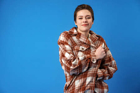 Studio portrait of young smiling woman with short hair.の写真素材