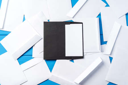 Stack of envelopes on working desk top view. Business mailの写真素材