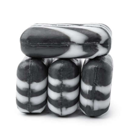 Stacked pieces of natural handmade soap on white background.の写真素材