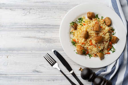 Plate with delicious homemade pilaf with meetの写真素材