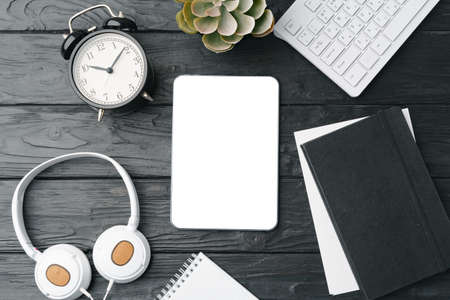 Office supplies and digital tablet on office table
