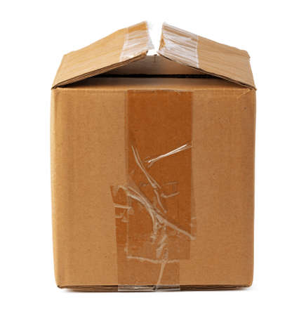 Open brown cardboard box isolated on whiteの写真素材