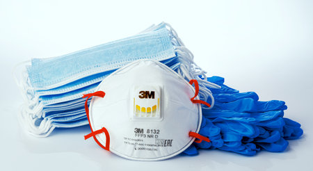 KRASNODAR, RUSSIA - JUNE 03, 2020 : 3M 8132 FFP3 respirator mask with blue medical masks and gloves on white backgroundのeditorial素材