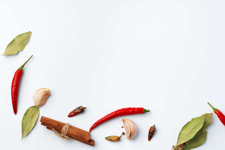 Variety of cooking spices on white background.の写真素材