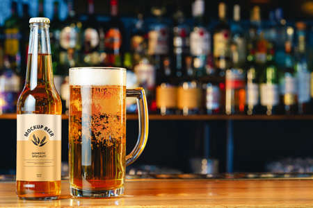 Beer bottle mock-up against blurred bar counterの写真素材