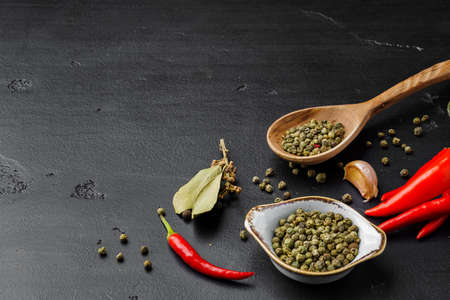 Flat lay composition with chili peppers and spicesの写真素材