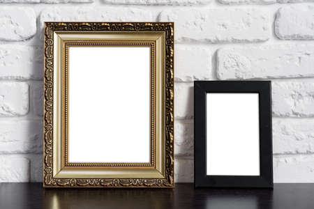 Photo frame with copy space against white brick wall