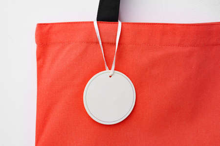 Eco bag for shopping with blank tag on white backgroundの写真素材