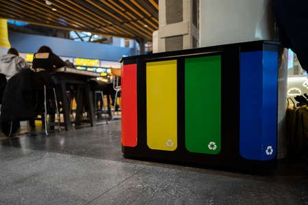 Trash containers for recycle in a shopping centerの写真素材