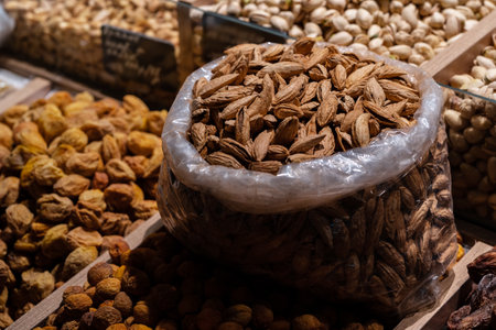Close-up of assorted nuts on market counterの写真素材