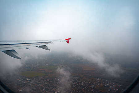 View through window of aircraft during flightの写真素材