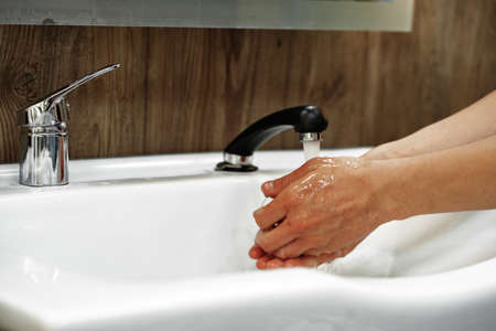 Workplace with a washbasin in barbershop close up
