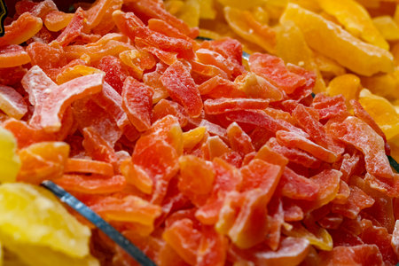 Pieces of dry candied fruits for backgroundの写真素材