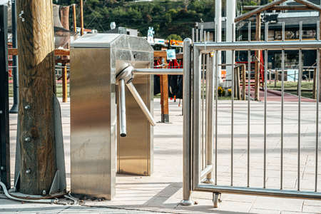 Outdoor entrance turnstile access system to the building