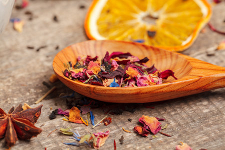 Handful of natural tea on a wodden surfaceの写真素材