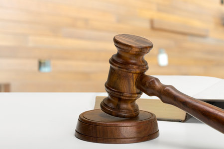 Law and justice concept image. Brown wooden backgroundの写真素材
