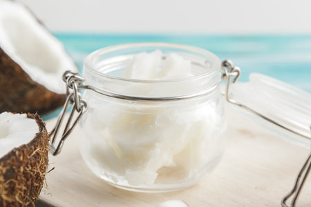 Coconut butter on wooden background. Organic healthy food conceptの写真素材