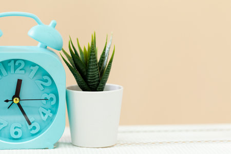 Alarm clock on wooden table close upの写真素材