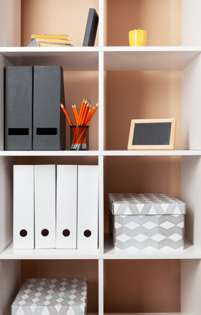 File folders, standing on the shelves at officeの写真素材