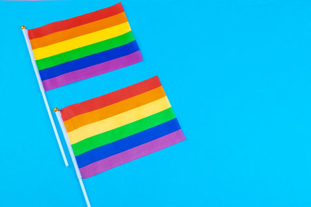 homosexual concept - close up of rainbow flagsの写真素材