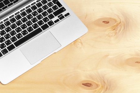 Office work table with laptop close upの写真素材