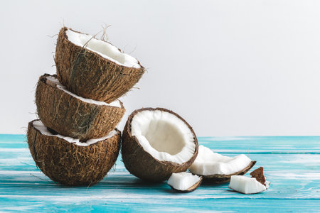 Damaged coconut pieces with shell close up