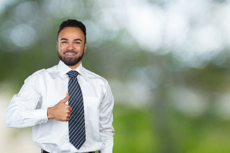 Happy young cool black man celebrating, OK signの写真素材