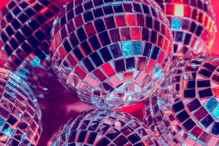 Mirror disco balls over pink background. Party, nightlife conceptの写真素材