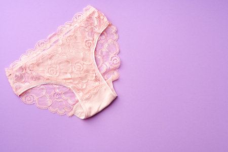 Womens panties on pink background with copy spaceの写真素材