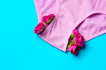 Womens panties with flower buds on paper backgroundの写真素材