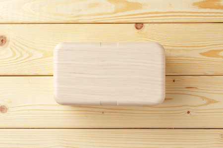 New empty plastic lunch box on a wooden backgroundの写真素材
