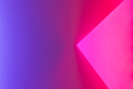 Blank paper sheets rolled in a neon purple lightingの写真素材