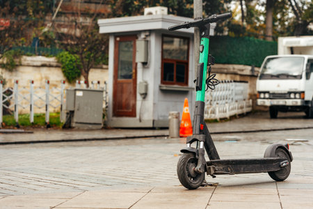 Modern electric scooter parked on the streetの写真素材
