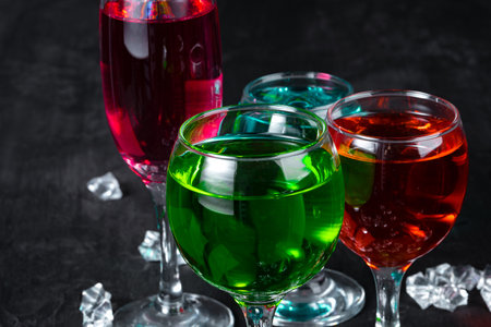 Beautiful alciohol cocktail on dark stone tableの写真素材
