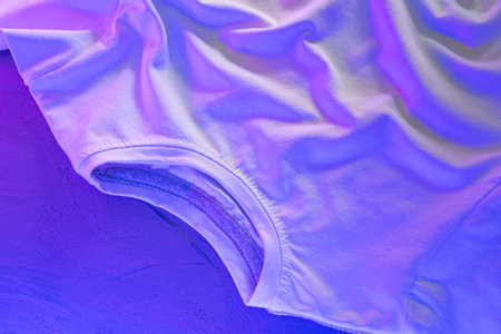 White color unisex t-shirt in neon lightの写真素材