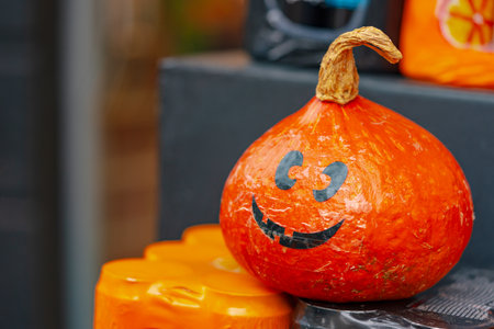 Halloween pumpkin in a market on a fruit shelfの写真素材