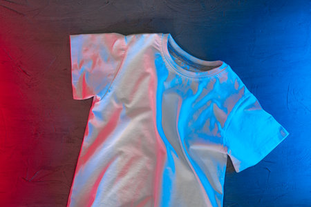White color unisex t-shirt in neon lightの写真素材