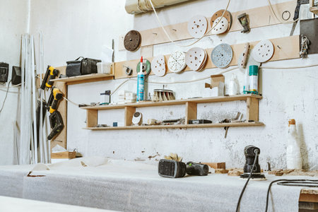 Carpentry shop interior with wood and tools