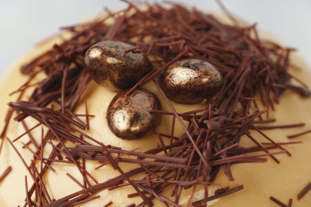 Easter cake with nest decor on gray background