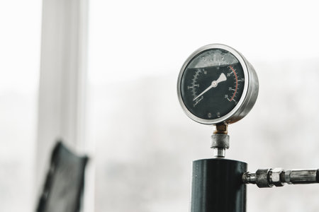 Round device for pressure measurement in car service close upの写真素材