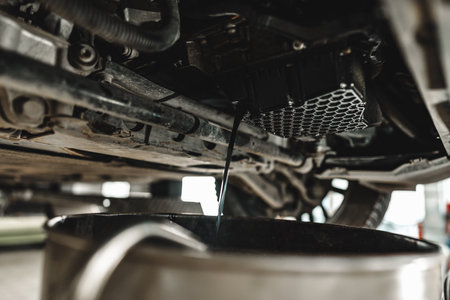 Process of oil change in a car serviceの写真素材