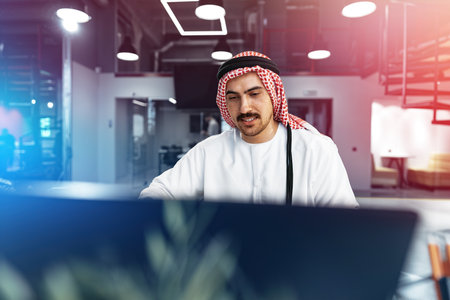 Young successful arab businessman working in the officeの写真素材