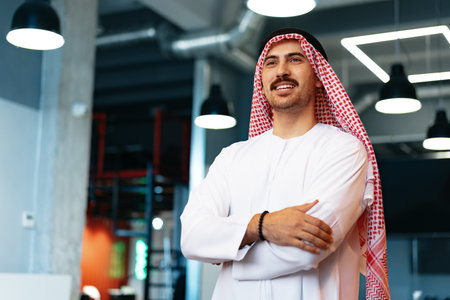 Successful muslim businessmen in traditional outfit in his officeの写真素材