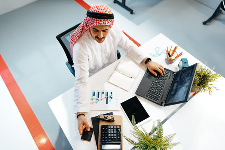 Young successful arab businessman working in the officeの写真素材