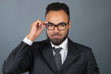 Handsome cheerful african american executive business manの写真素材