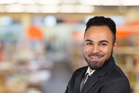 Handsome cheerful african american executive business manの写真素材