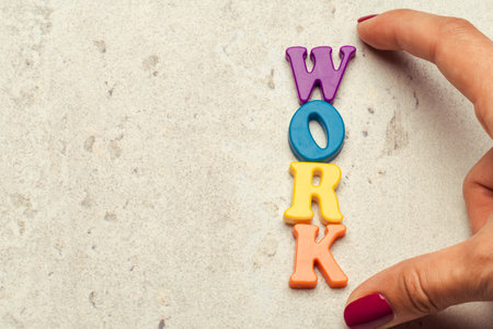 Colorful letters on background closeup, business concept