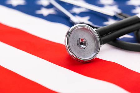 Stethoscope on American national flag, close upの写真素材